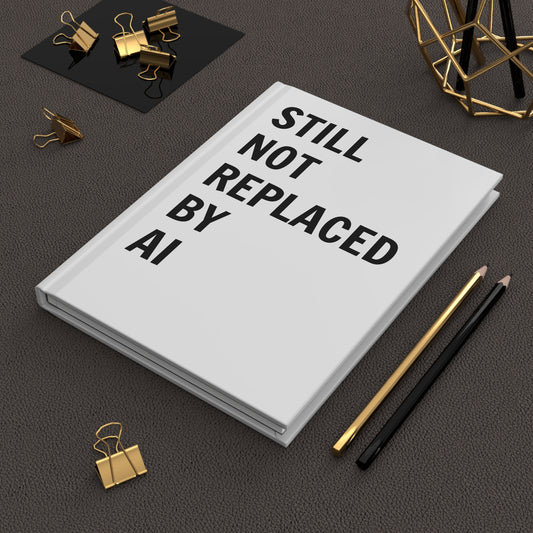 Still Not Replaced by AI – Hardcover Matte Journal for Coders | 150 Lined Pages, Anti-AI Writing Notebook