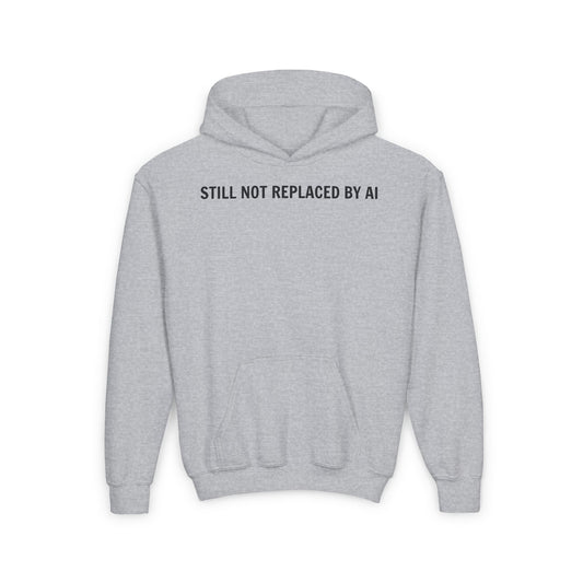 Still Not Replaced by AI – Youth Tech Hoodie for Future Coders | Ultra-Soft Blend Sweatshirt